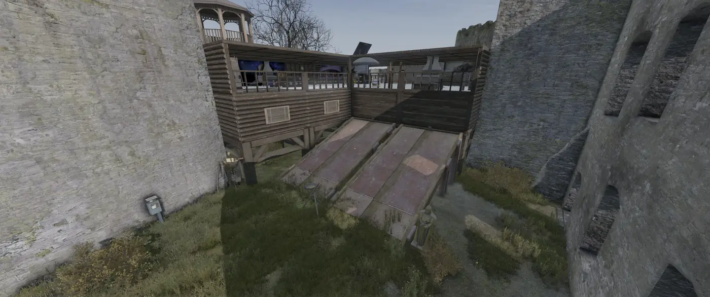 A wooden BaseBuildingPlus base with ramps and a lookout built between old castle walls on Is Dead