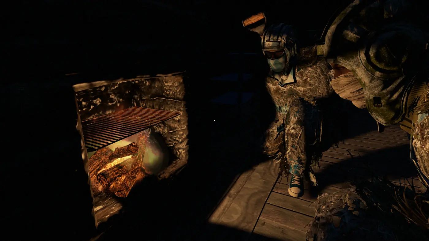 Two masked survivors in ghillie gear crouched by a fireplace inside a base at night on Is Dead
